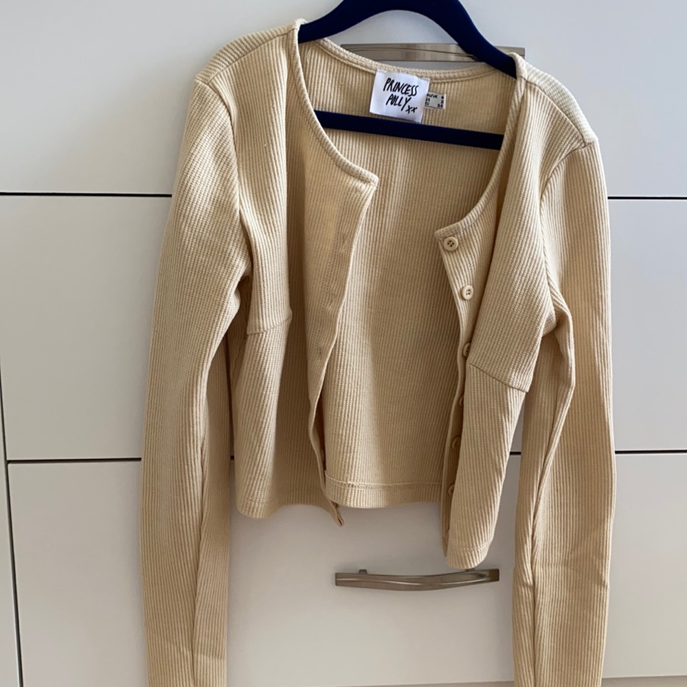 Beige colored cropped sweater from Princess Polly